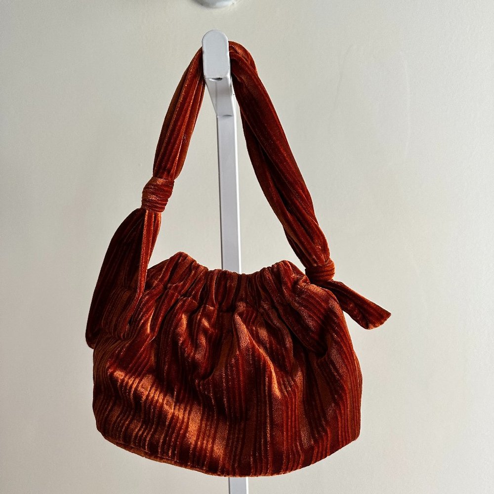 Rust velvet bag from Anthropologie